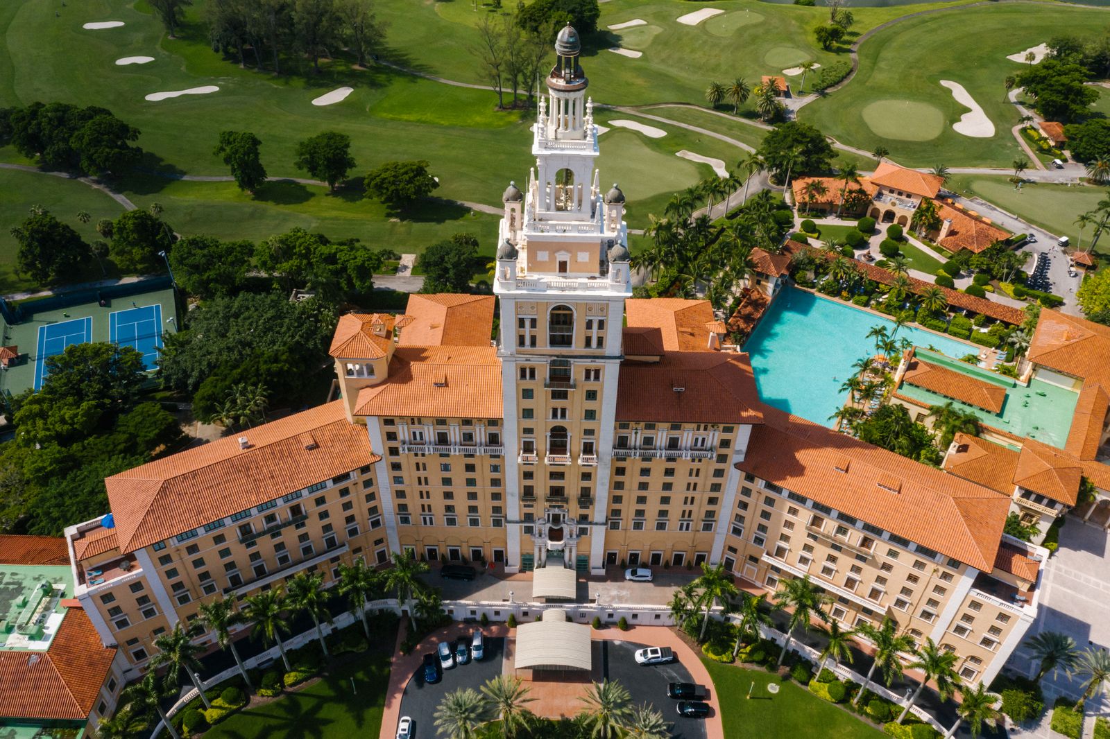 Aerial view of the Biltmore Hotel in Coral Gables, showing its Mediterranean Revival architecture and red-tile roofs