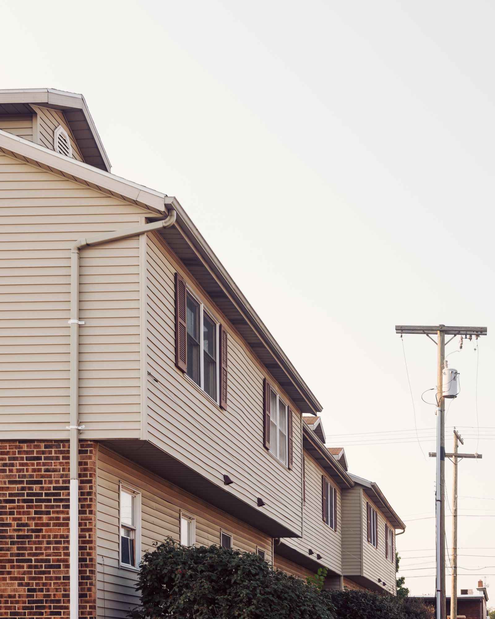 Row of suburban townhomes along a residential street